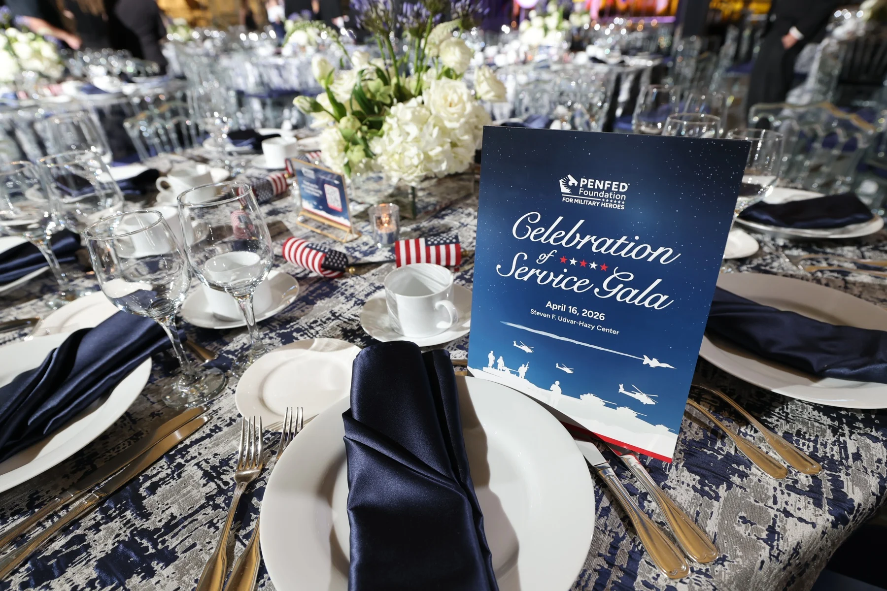 Celebration of Service Gala menu at a place setting